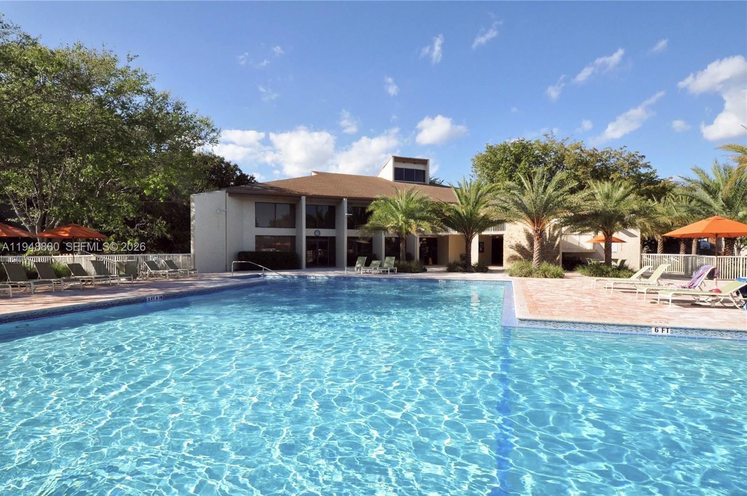 11416 Southwest 110th Lane Miami, FL 33176 - Photo 20 of 25 a view of a house with swimming pool