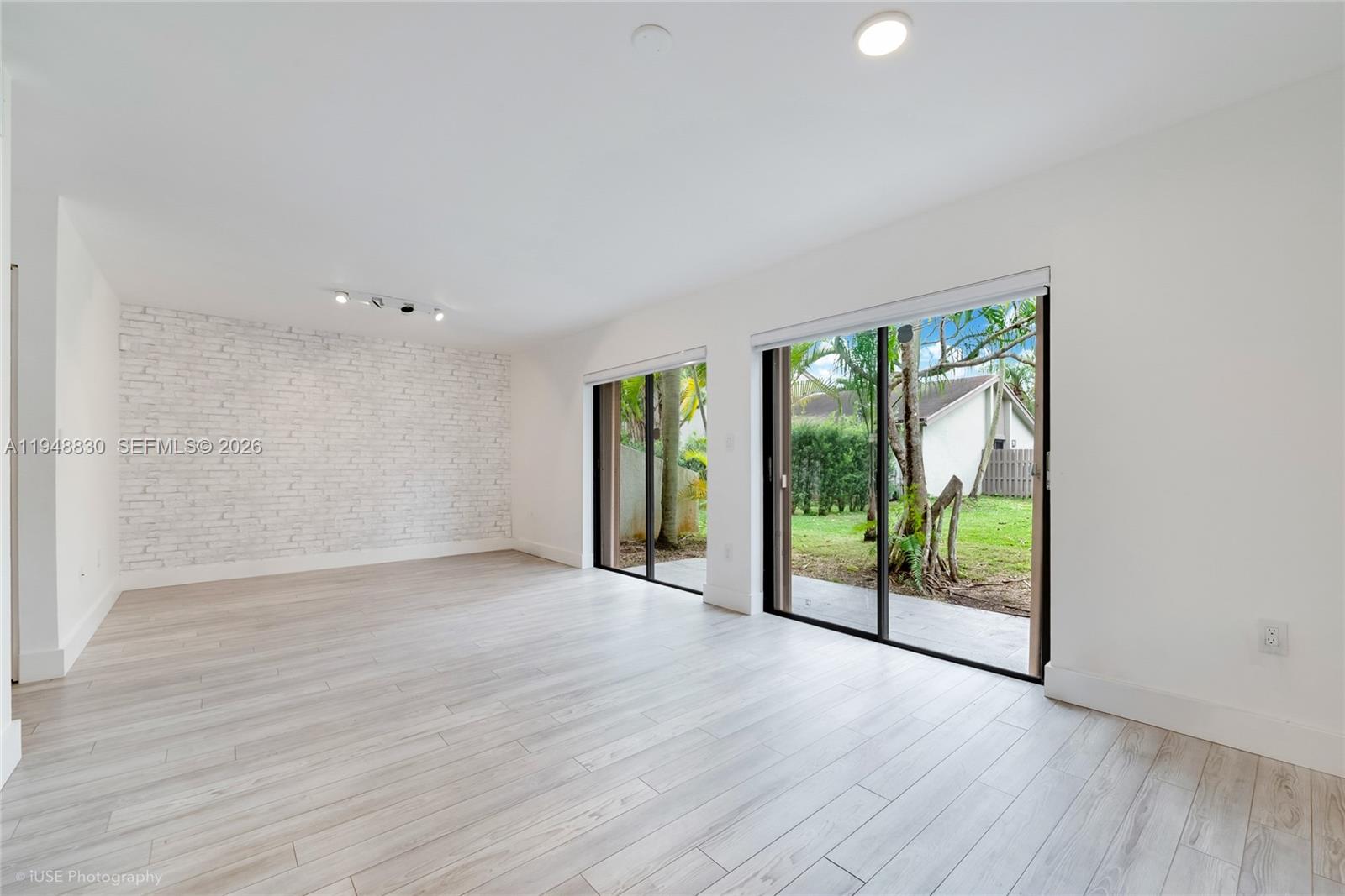 11416 Southwest 110th Lane Miami, FL 33176 - Photo 8 of 25 a view of an entryway with wooden floor