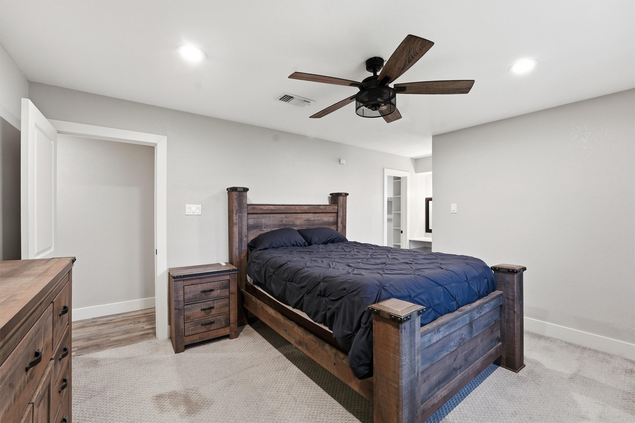 431 Dover Lane Spring, TX 77373 - Photo 12 of 19 a bed room with a bed and a ceiling fan