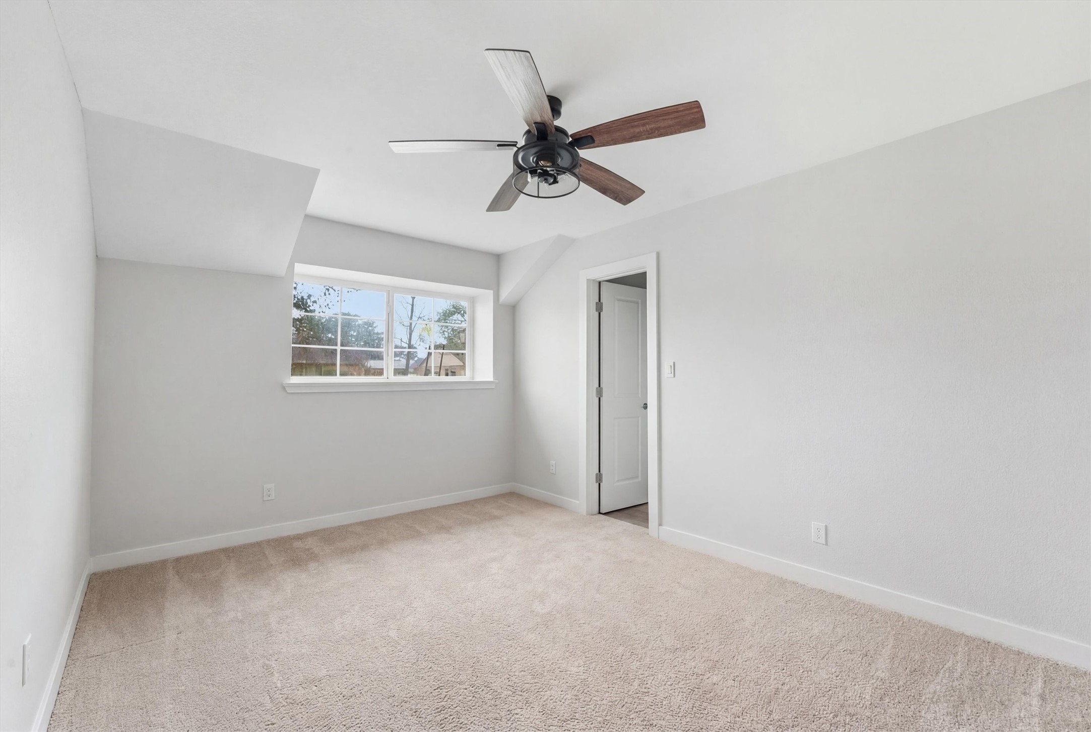 431 Dover Lane Spring, TX 77373 - Photo 16 of 19 a view of an empty room with a window