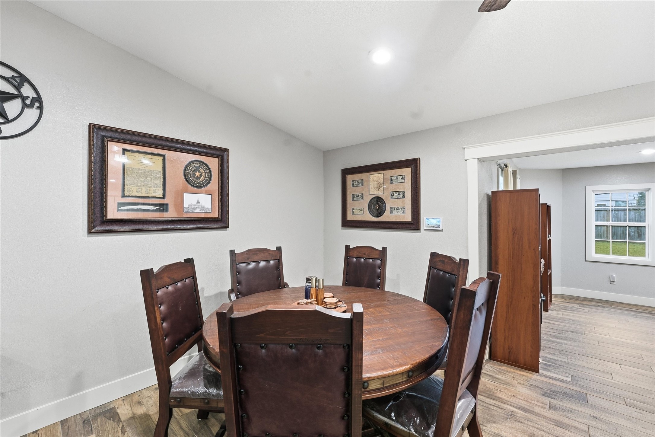 431 Dover Lane Spring, TX 77373 - Photo 3 of 19 a view of a dining room with furniture window and wooden floor