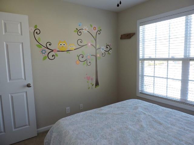 2701 Hidden Ridge Court Clarksville, TN 37043 - Photo 12 of 25 a bedroom with a bed and a window