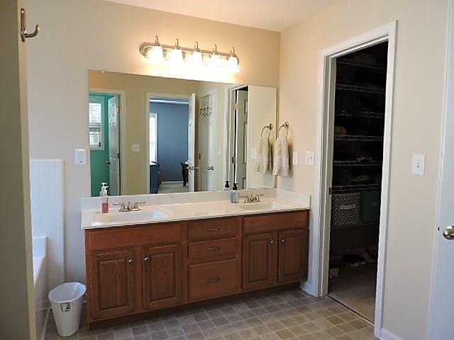 2701 Hidden Ridge Court Clarksville, TN 37043 - Photo 17 of 25 a spacious bathroom with a double vanity sink and a mirror