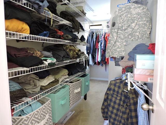 2701 Hidden Ridge Court Clarksville, TN 37043 - Photo 20 of 25 a view of walk in closet with clothes and shoes