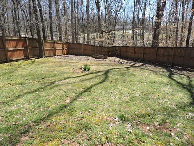 2701 Hidden Ridge Court Clarksville, TN 37043 - Photo 22 of 25 a swimming pool with yard and tree in back