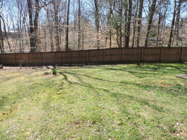 2701 Hidden Ridge Court Clarksville, TN 37043 - Photo 23 of 25 a view of a backyard with wooden fence