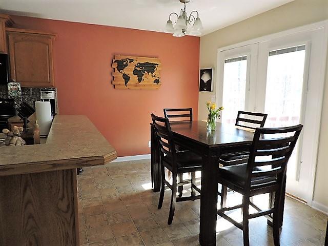 2701 Hidden Ridge Court Clarksville, TN 37043 - Photo 6 of 25 a view of a dining room with furniture and window