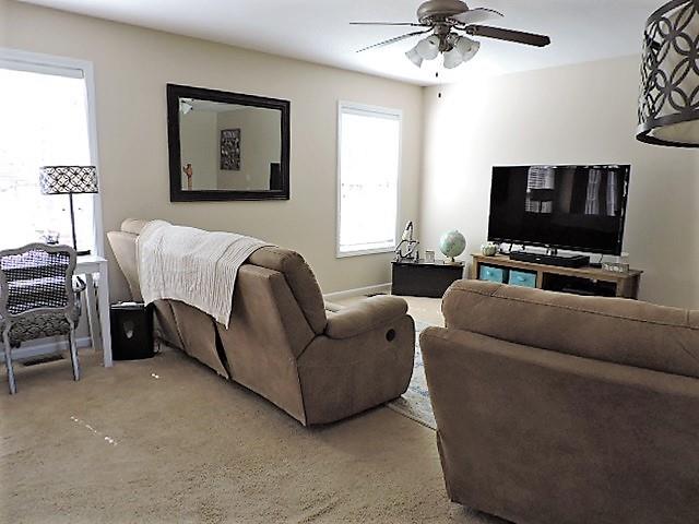 2701 Hidden Ridge Court Clarksville, TN 37043 - Photo 7 of 25 a living room with furniture and a flat screen tv