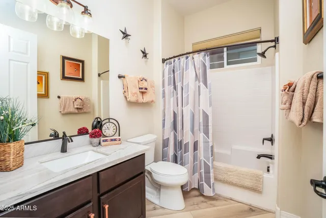 a bedroom with bed and window