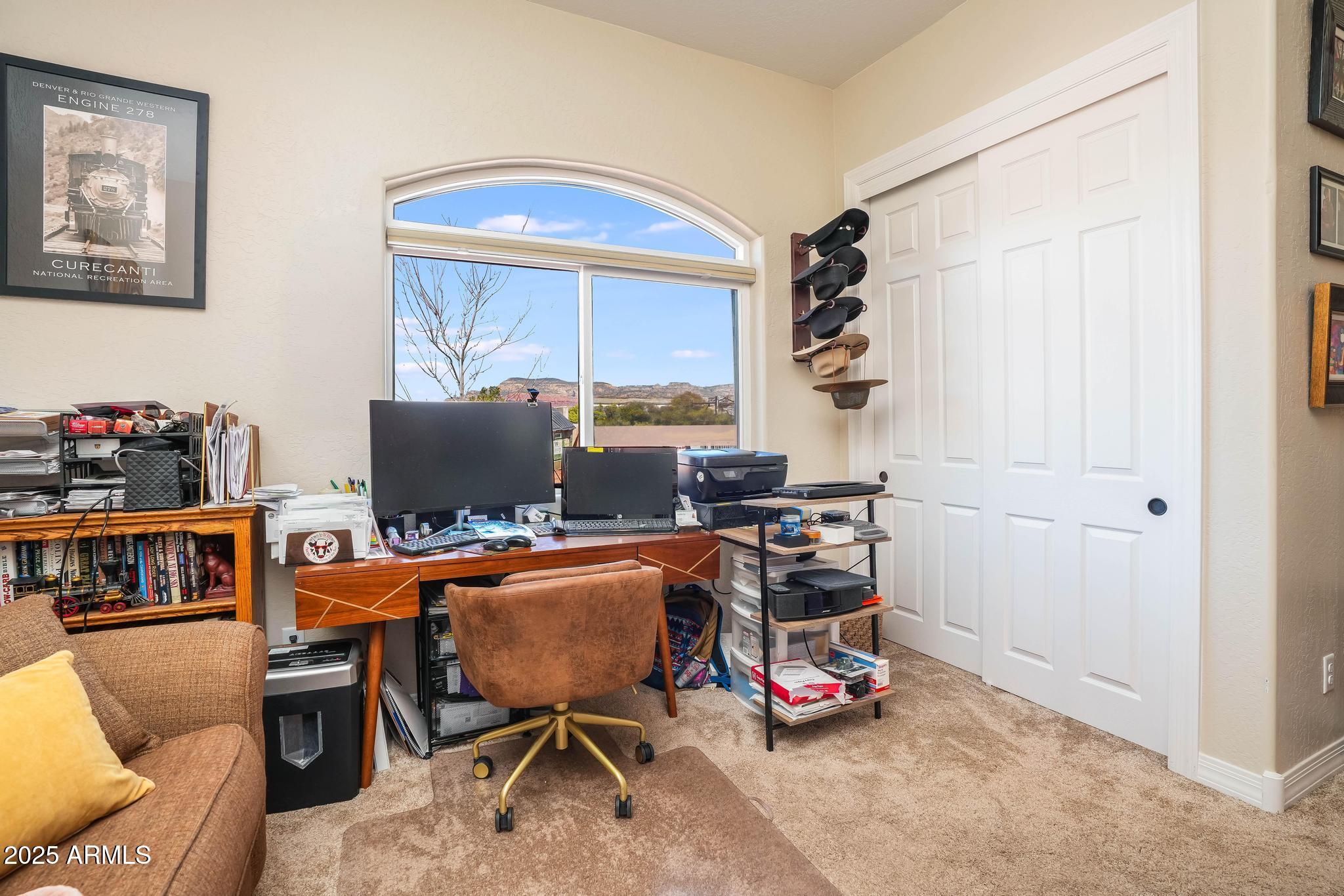 3835 Portofino Way Sedona, AZ 86336 - Photo 27 of 48 a view of a workspace with furniture and a window