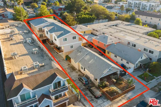 a front view of house with yard and trees