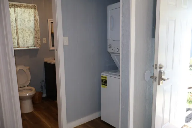 a bathroom with a toilet and a sink