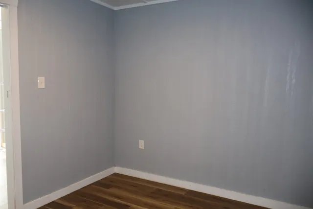 a view of small space with wooden floor