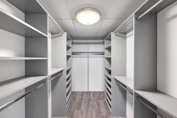 a kitchen with a refrigerator and countertop