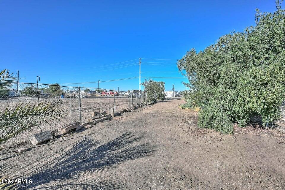 3339 West Washington Street, Unit 2 Phoenix, AZ 85009 - Photo 2 of 5 a view of a road with a building in the background
