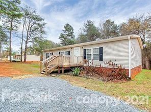 143 Francis Road Blacksburg, SC 29702 - Photo 1 of 15 a view of house with backyard and seating area