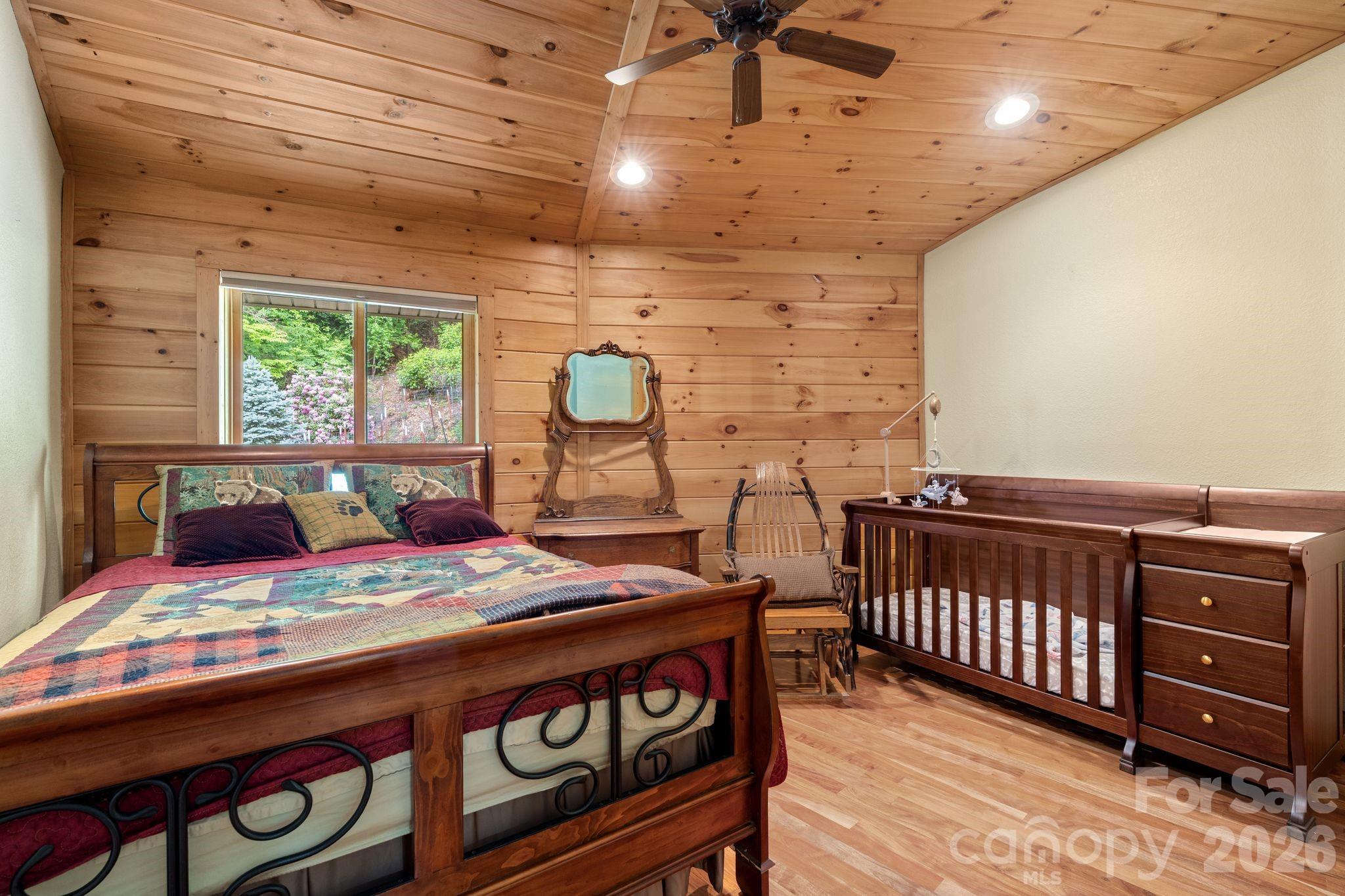 140 Slim Ridge Maggie Valley, NC 28751 - Photo 14 of 33 a view of a dining room with furniture window and outside view