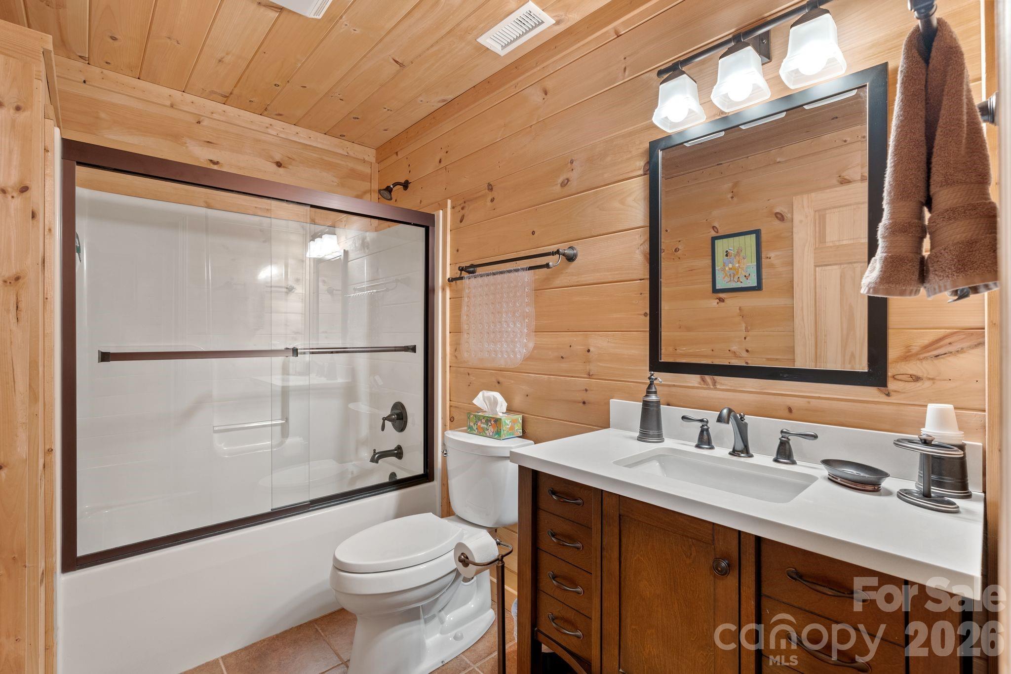 140 Slim Ridge Maggie Valley, NC 28751 - Photo 19 of 33 a bathroom with a sink toilet and shower
