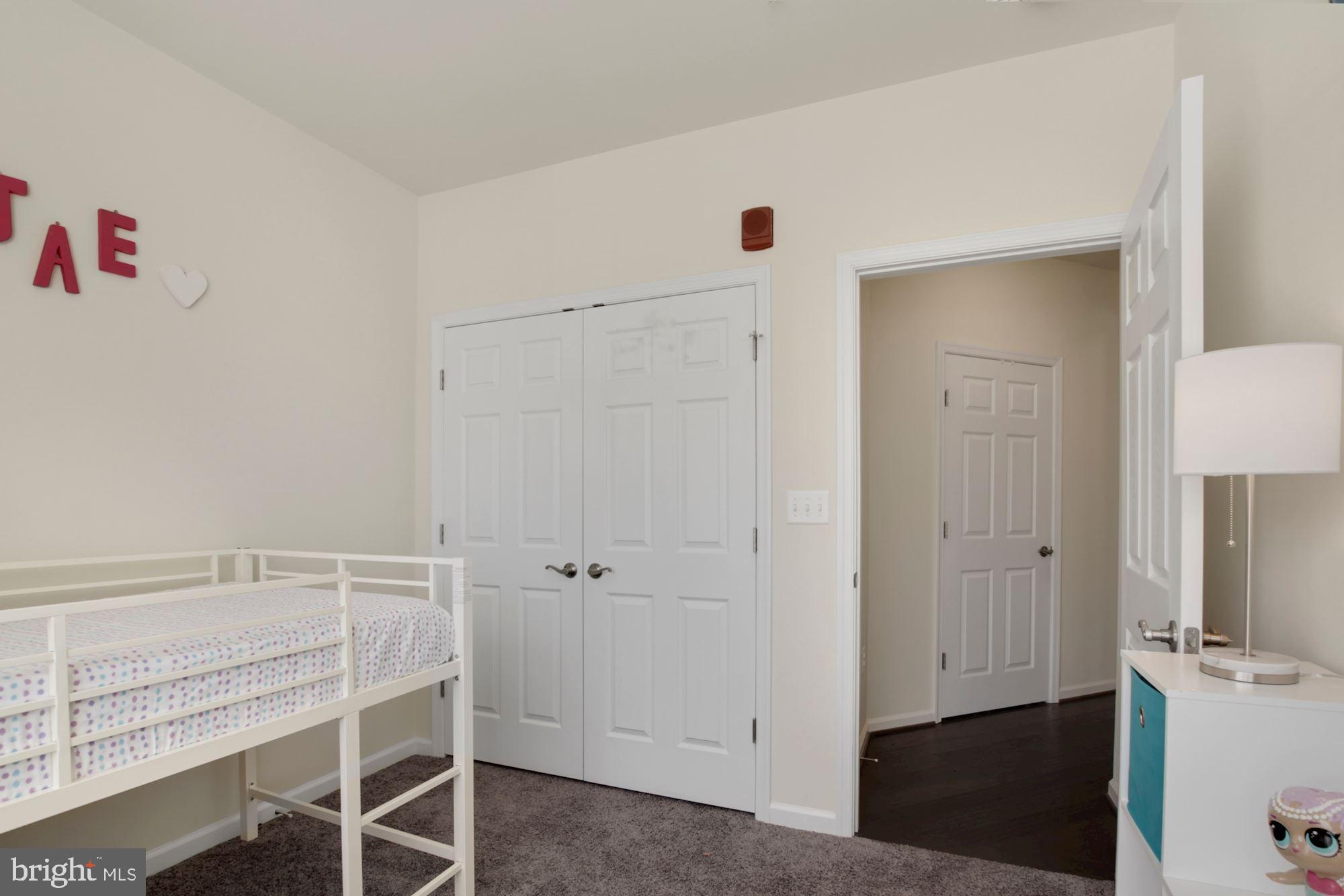 3825 Doc Berlin Drive, Unit 17 Silver Spring, MD 20906 - Photo 24 of 34 a room with a door and a table