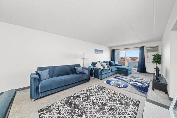a living room with furniture and a couch
