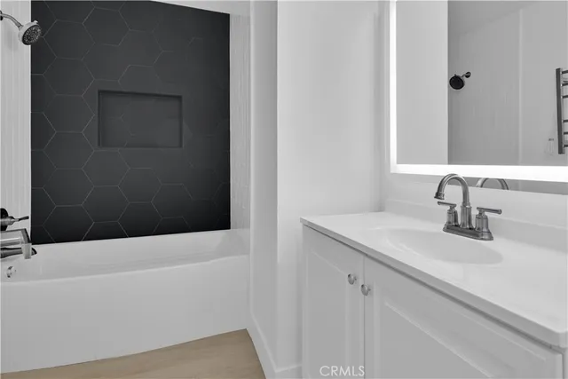 a bathroom with a sink and a bathtub