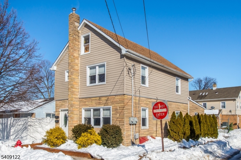 a view of a street with buildings