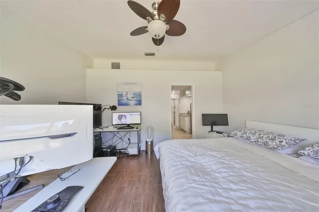 a bedroom with a bed and furniture