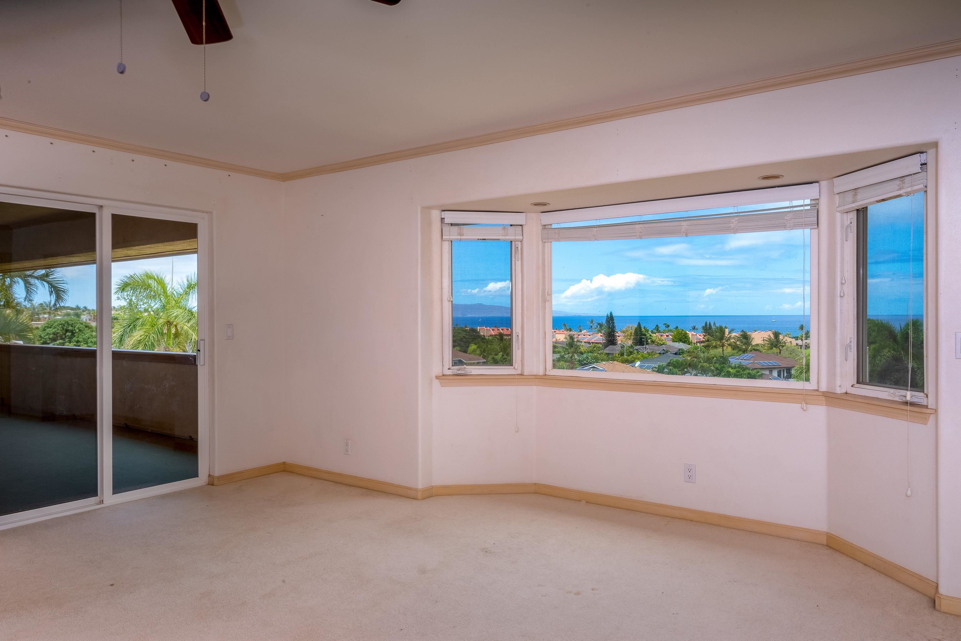 216 Kamakoi Loop Kihei, HI 96753 - Photo 26 of 30 an empty room with a window