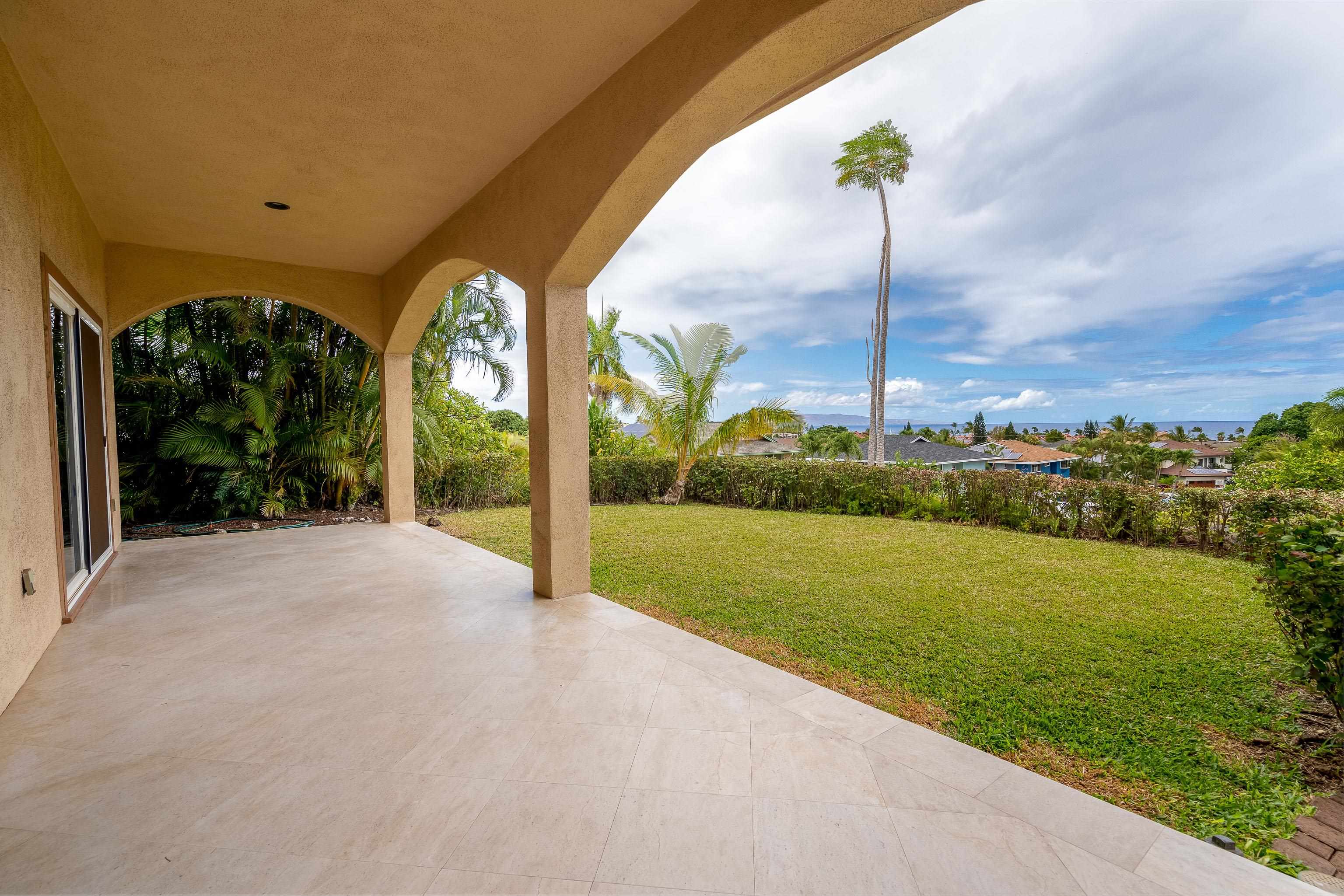 216 Kamakoi Loop Kihei, HI 96753 - Photo 5 of 30 a view of a garden with an buildings