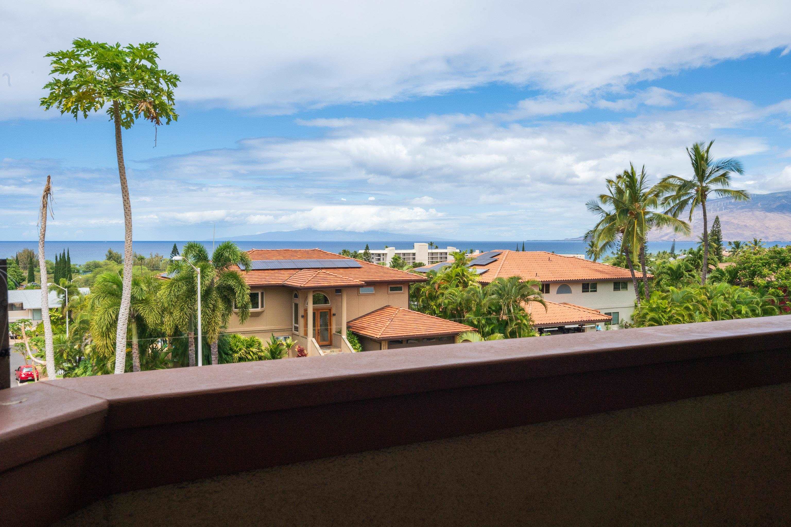216 Kamakoi Loop Kihei, HI 96753 - Photo 7 of 30 a view of a lake with a road from a balcony