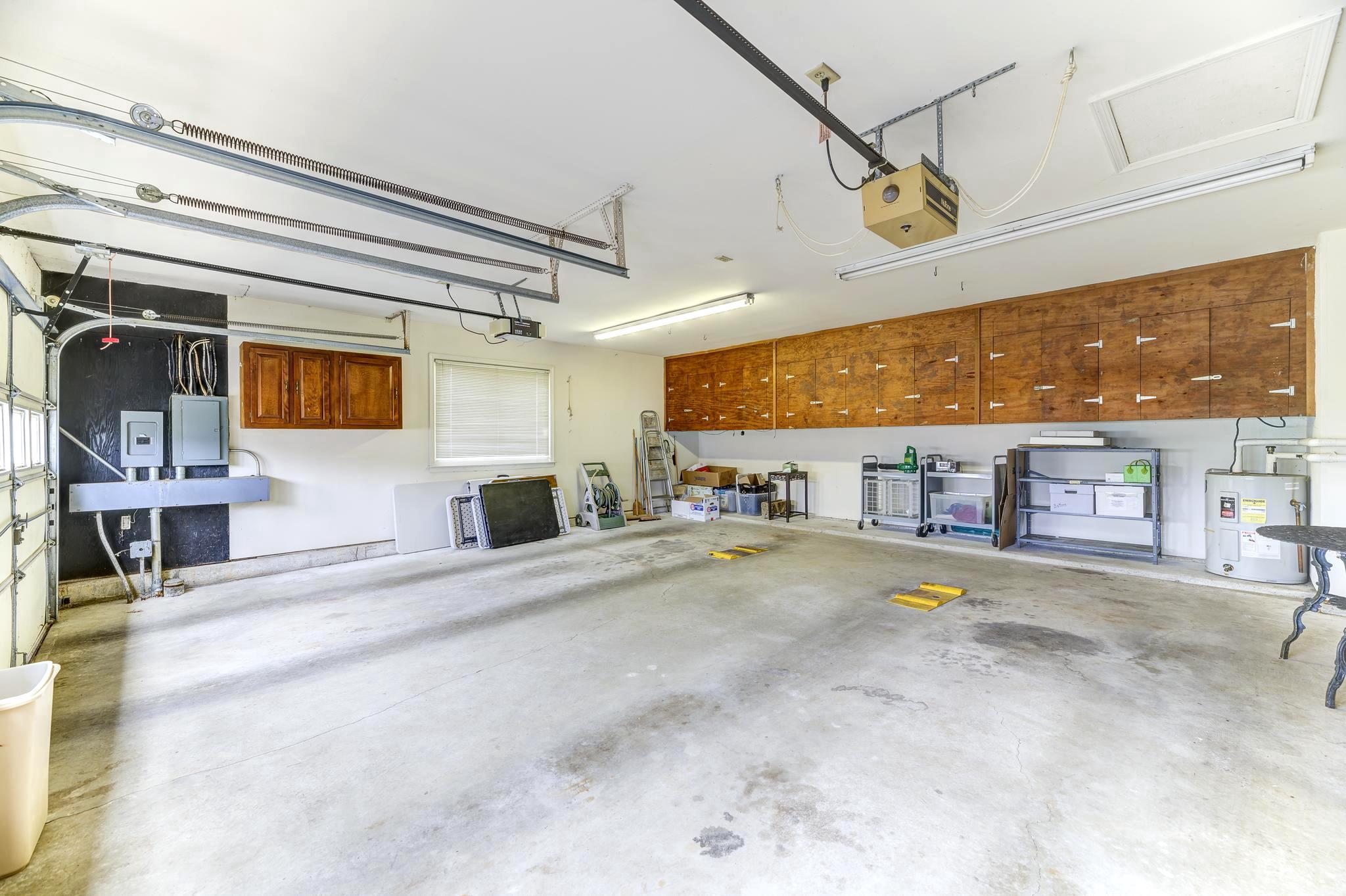 321 Sharon Way Monroe Township, NJ 08831 - Photo 44 of 55 Oversized Double Garage with deep cabinets