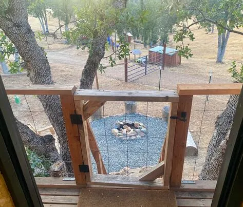 a view of balcony with furniture