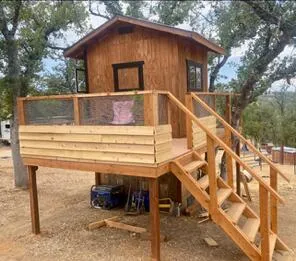 a house with trees in front of it