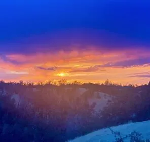 a view of a field with an outdoor space