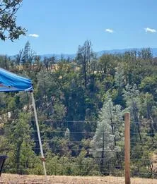 a view of house with outdoor seating space