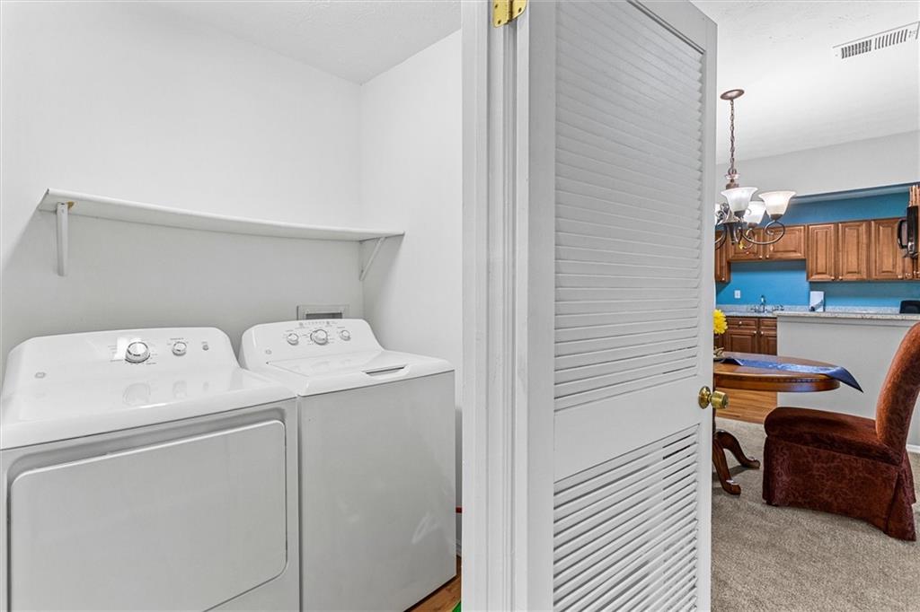 1610 Raleigh Circle Marietta, GA 30067 - Photo 29 of 33 a utility room with dryer and washer