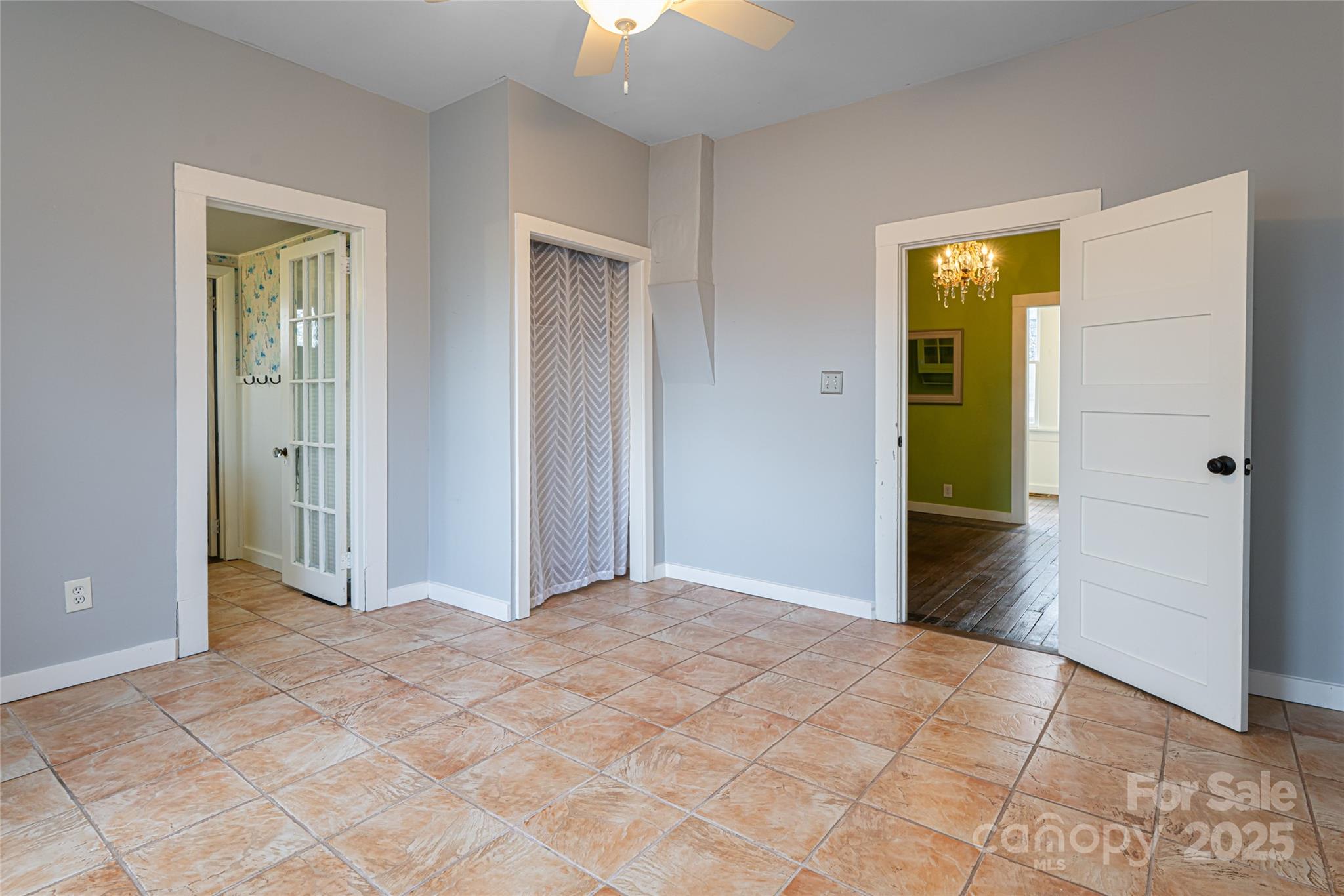 40 Jonestown Road Asheville, NC 28804 - Photo 12 of 46 a view of a hallway with wooden floor and a bathroom