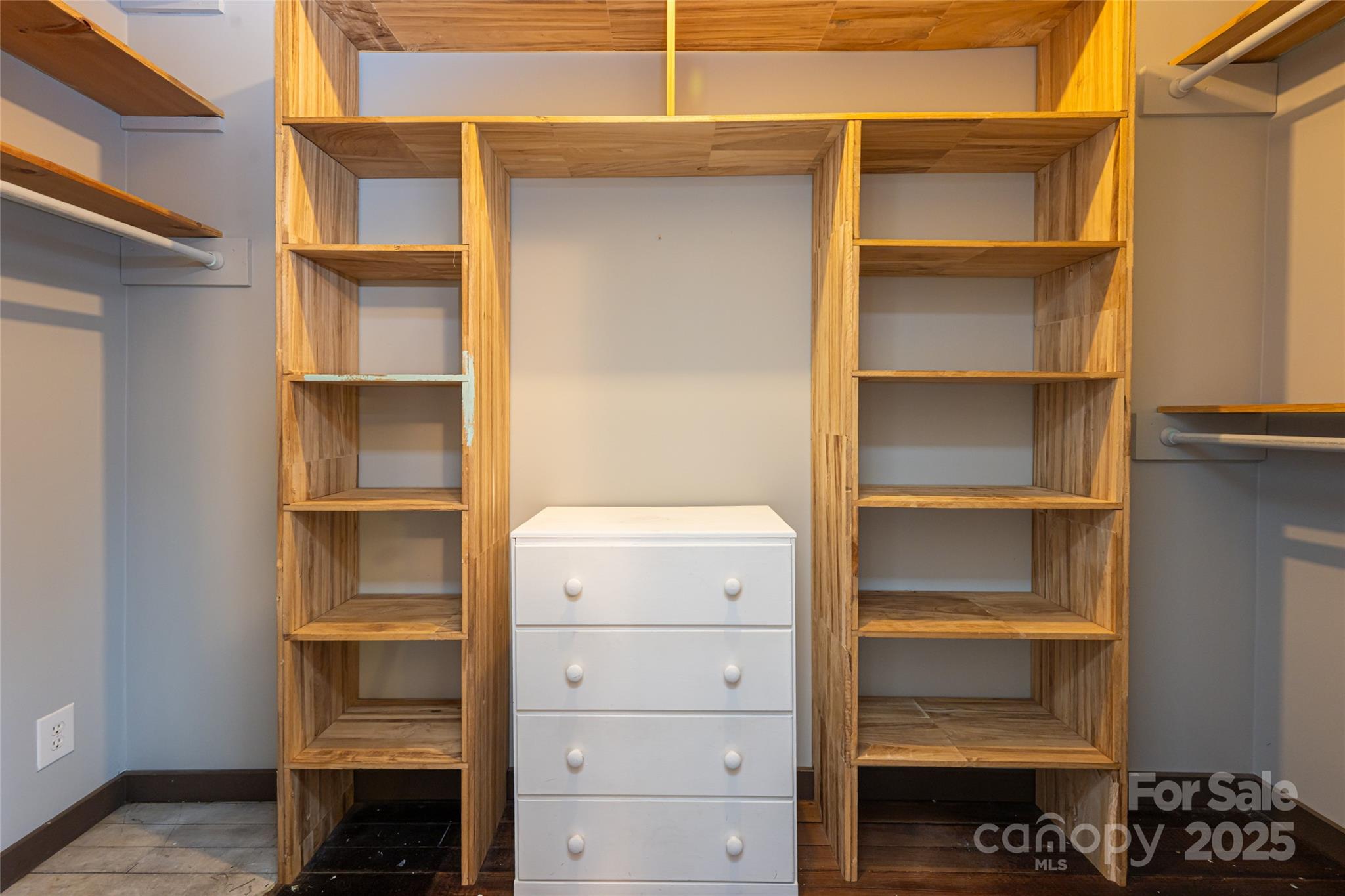 40 Jonestown Road Asheville, NC 28804 - Photo 14 of 46 a view of walk in closet with empty racks