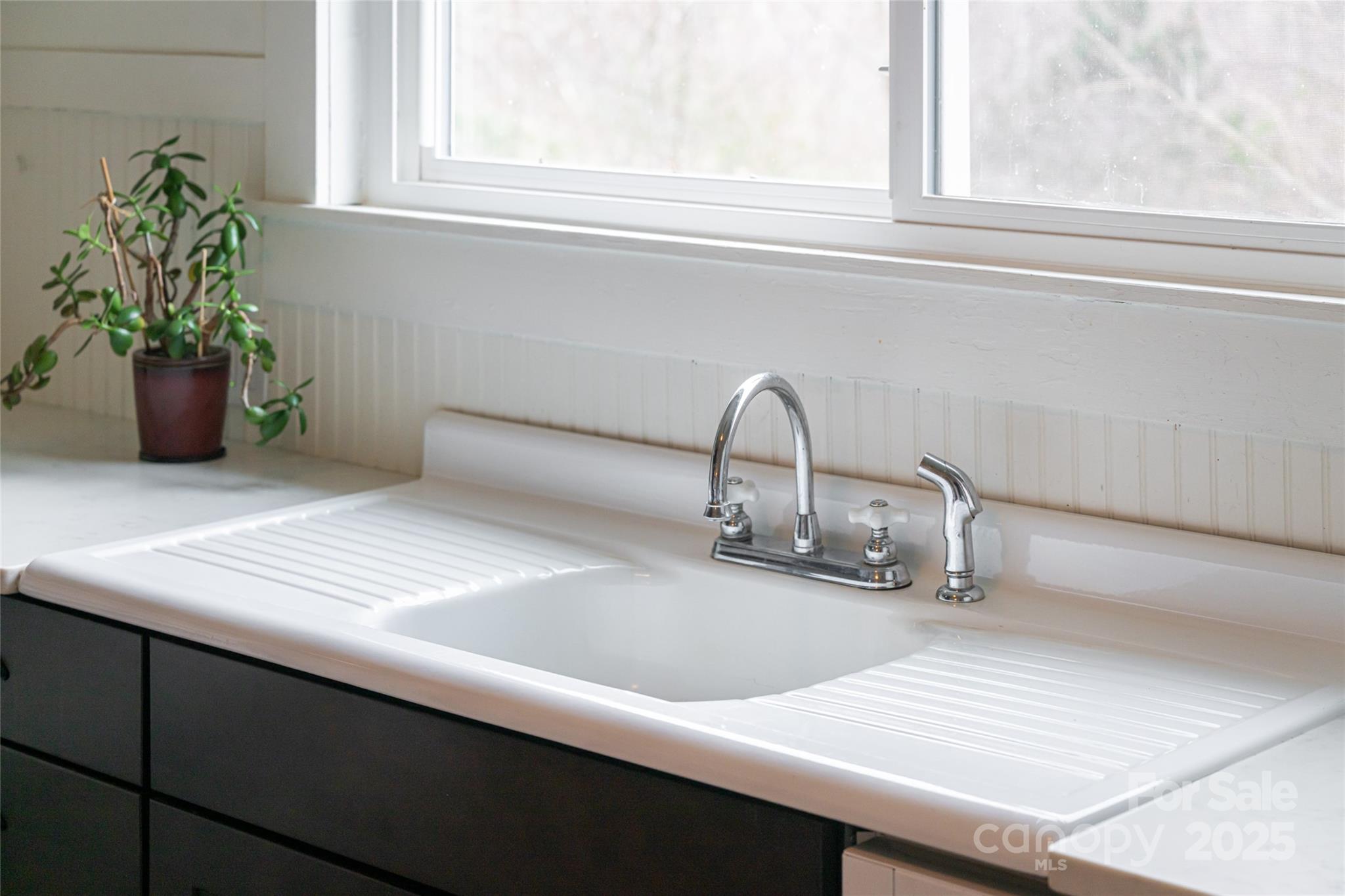 40 Jonestown Road Asheville, NC 28804 - Photo 21 of 46 a kitchen with a sink and a window