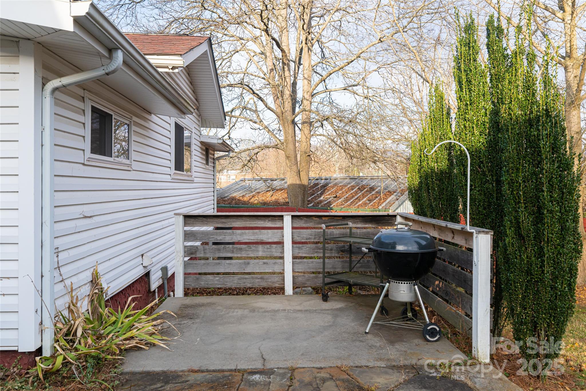40 Jonestown Road Asheville, NC 28804 - Photo 26 of 46 a view of house with backyard and outdoor seating