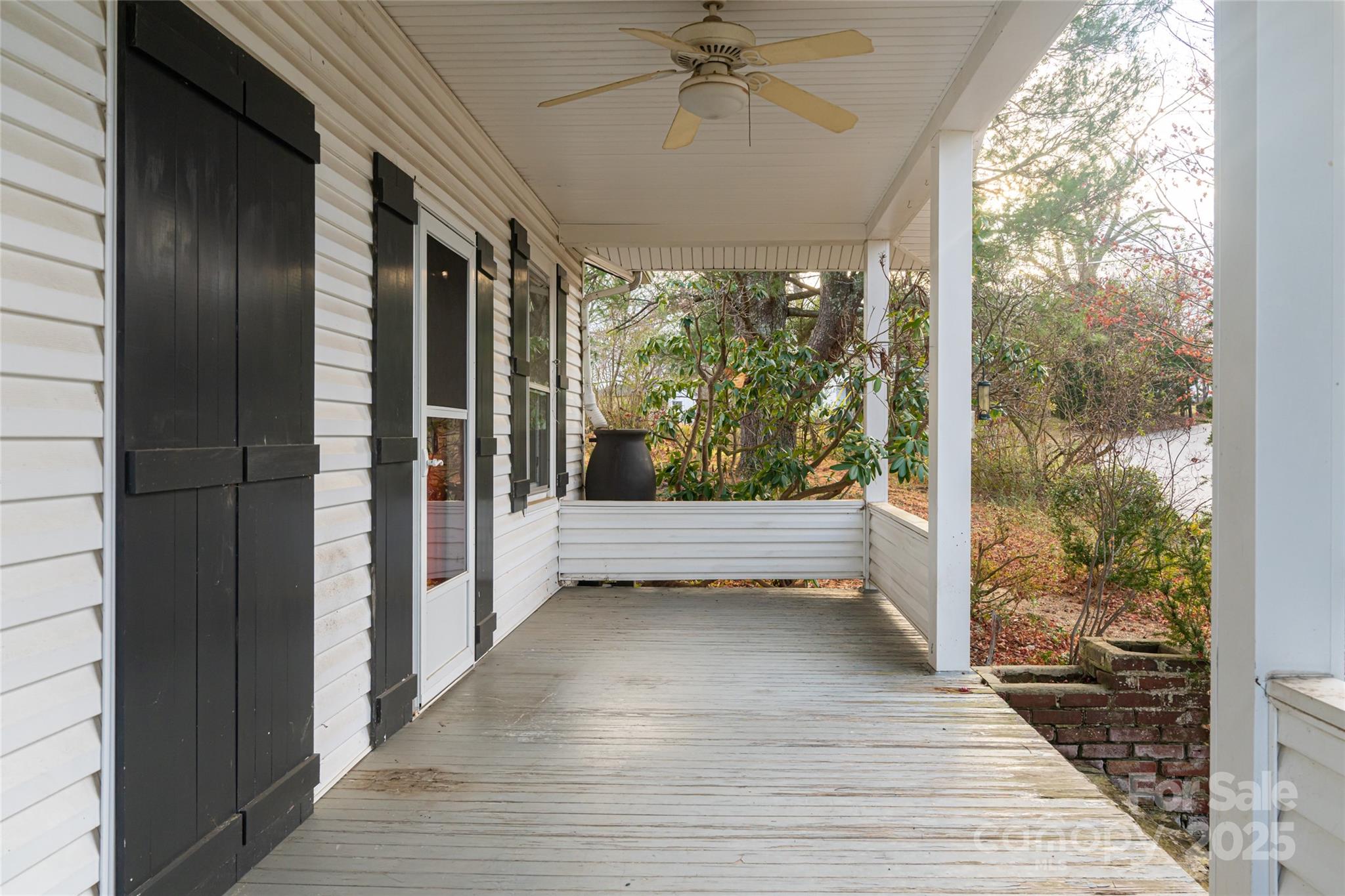 40 Jonestown Road Asheville, NC 28804 - Photo 5 of 46 a view of a room with wooden floor and windows