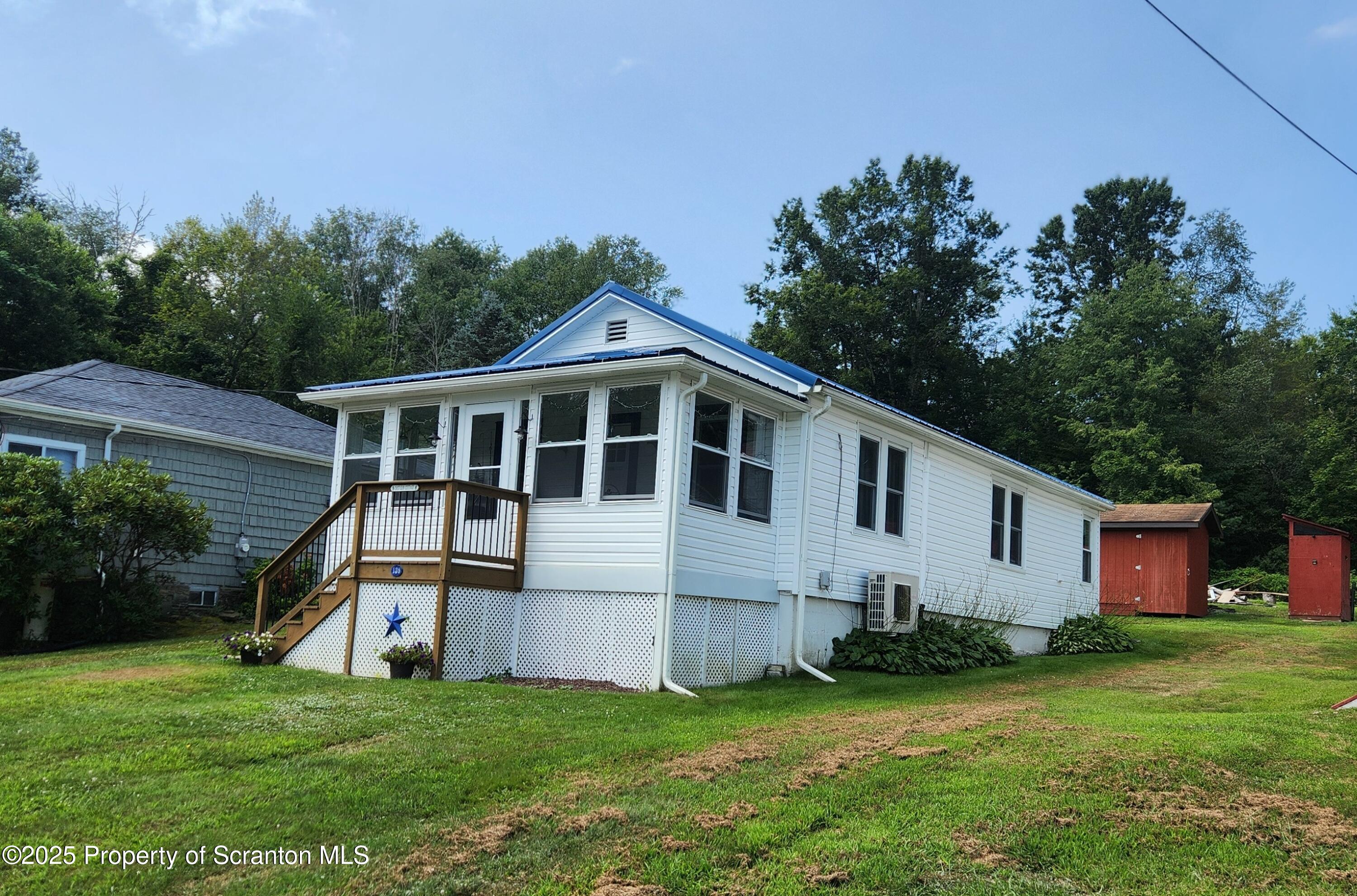 135 Pedrick Road Nicholson, PA 18446 - Photo 13 of 16 a view of a house with a yard