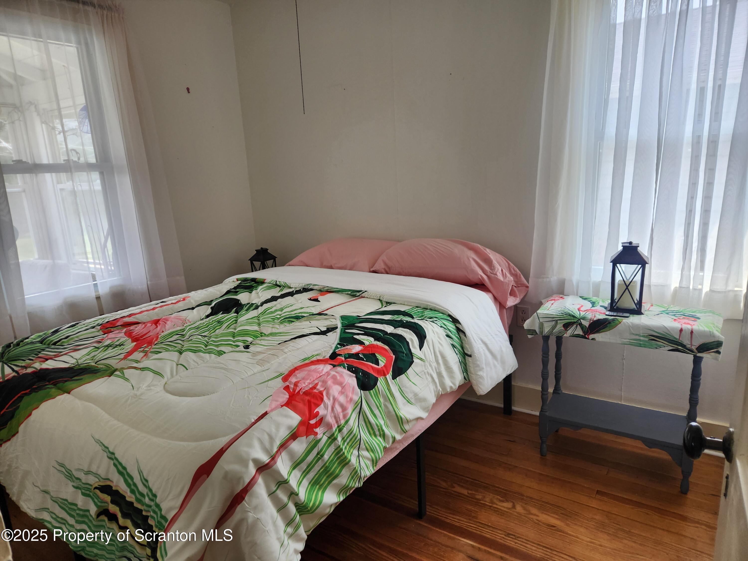 135 Pedrick Road Nicholson, PA 18446 - Photo 7 of 16 a bedroom with a bed and a window