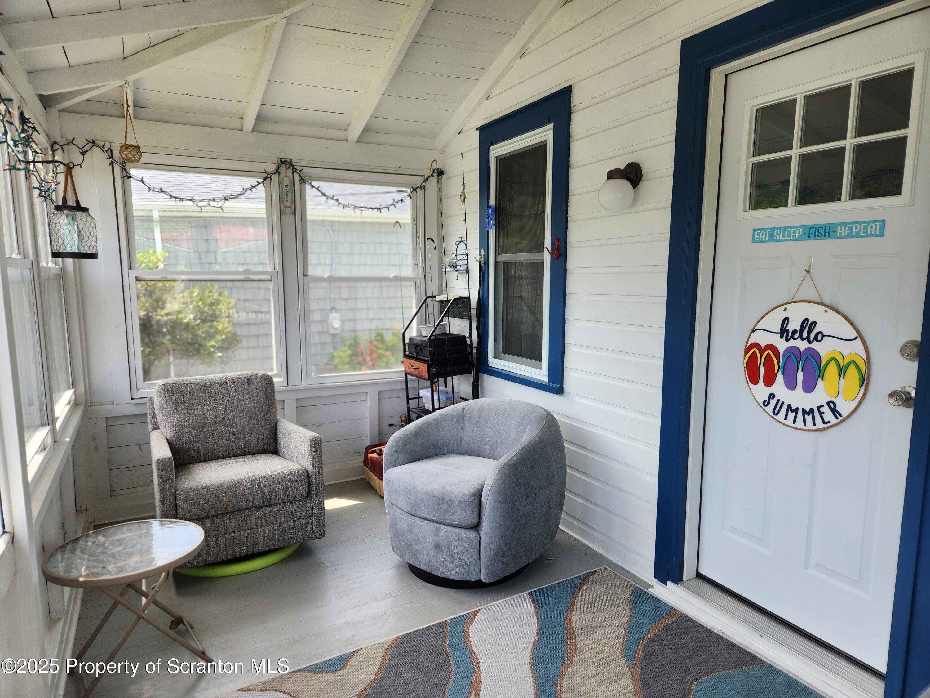 135 Pedrick Road Nicholson, PA 18446 - Photo 8 of 16 a living room with furniture and a window