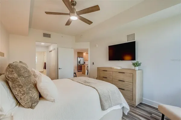 a bedroom with bed and window