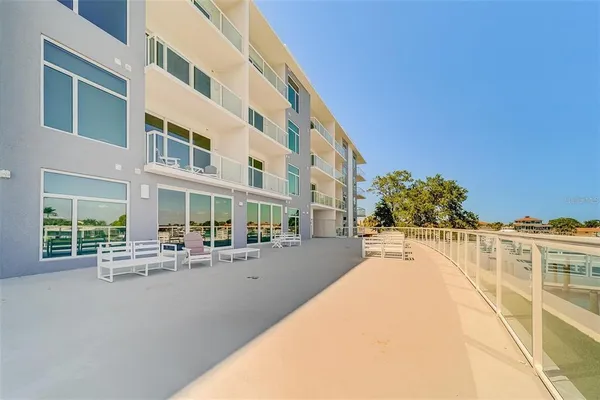 a view of a terrace with chairs