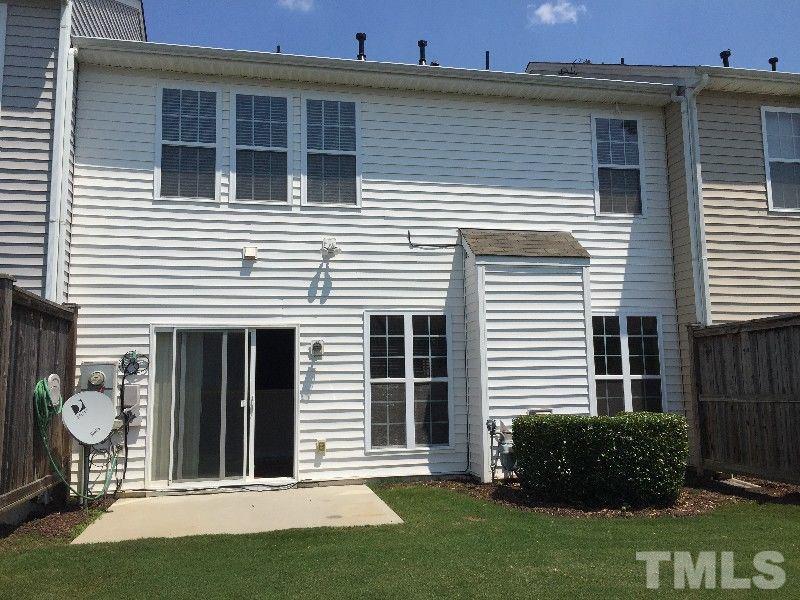 8215 Pilots View Drive Raleigh, NC 27617 - Photo 2 of 18 a view of a house with a yard and plants