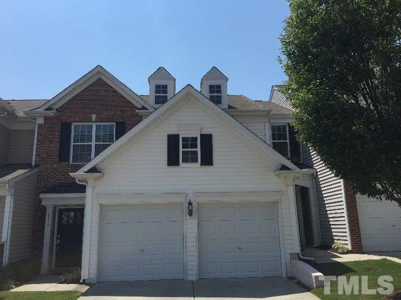 8215 Pilots View Drive Raleigh, NC 27617 - Photo 16 of 18 a front view of a house with a yard