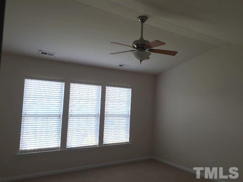 8215 Pilots View Drive Raleigh, NC 27617 - Photo 8 of 18 a view of a livingroom with a window