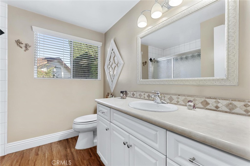 12110 Braemore Place Porter Ranch, CA 91326 - Photo 20 of 45 a bathroom with a sink and a toilet